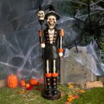 4ft Black and Orange Halloween Nutcracker Skeleton with Skull Staff and LED Lights